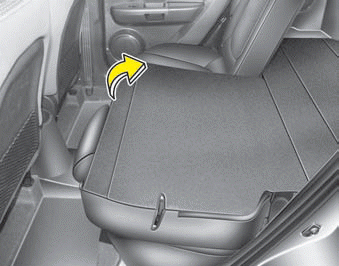 5. To use the rear seat, lift and pull the seatback backward by pulling on the