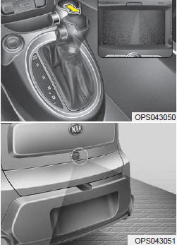 The rear camera display will activate when the back-up light is ON with the ignition