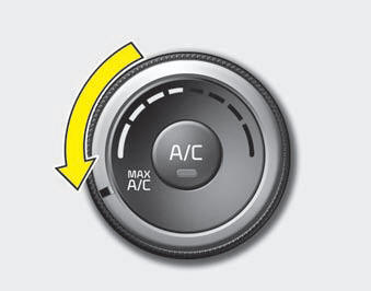 To operate the MAX A/C, turn the temperature knob to extreme left. Air flow is